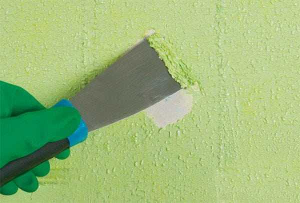 Удаление краски с бетонной стены